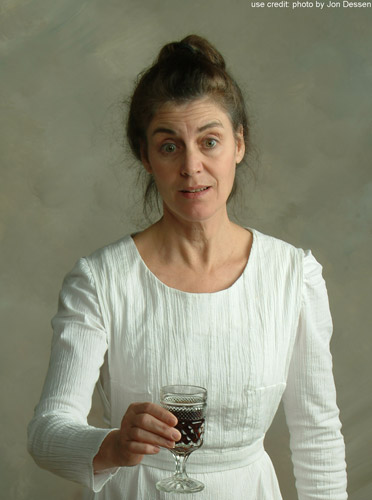 Patricia as Emily Dickinson, with a glass of wine